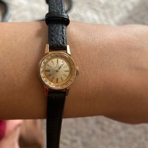 omega women black watch